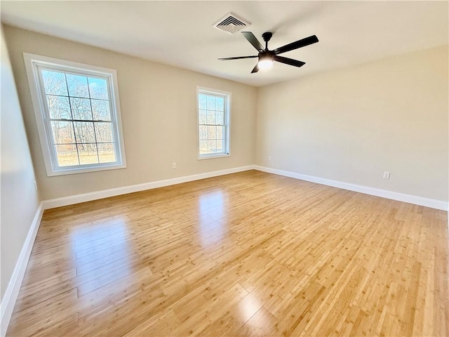 unfurnished room featuring ceiling fan and light hardwood / wood-style floors