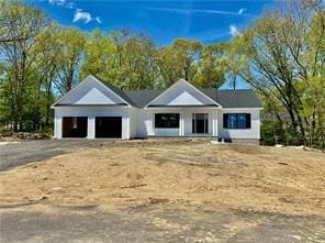 modern farmhouse style home with a garage