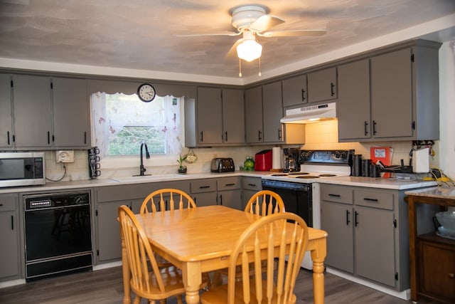 kitchen with gray cabinetry, dishwasher, dark hardwood / wood-style flooring, and white range with electric cooktop