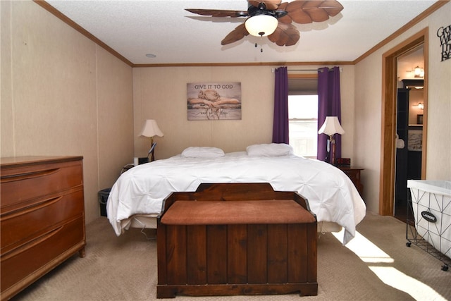 bedroom featuring ceiling fan, crown molding, light colored carpet, and a textured ceiling