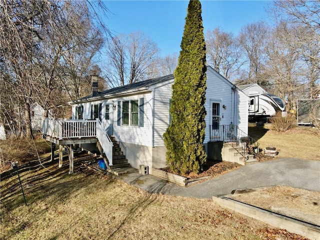 exterior space featuring a deck