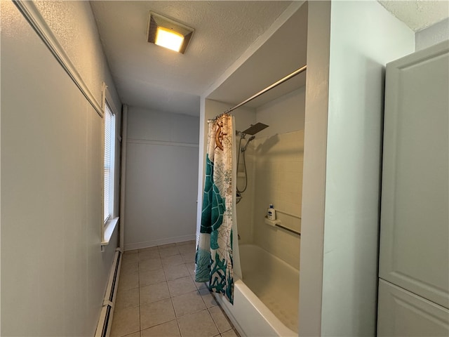 bathroom featuring baseboard heating, shower / bath combo with shower curtain, tile patterned flooring, and a healthy amount of sunlight