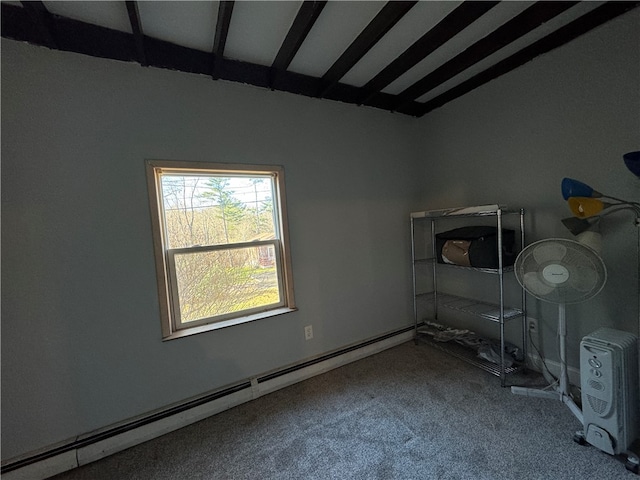 carpeted empty room featuring baseboard heating and vaulted ceiling with beams