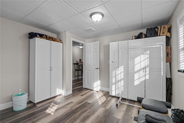 workout area featuring wood-type flooring