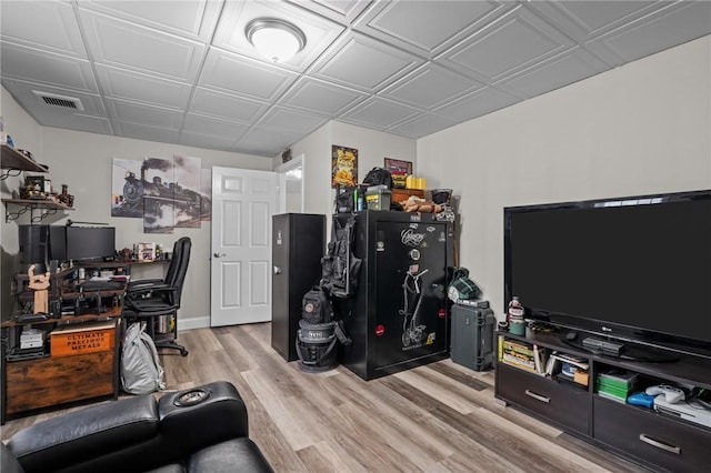 office space with light hardwood / wood-style flooring