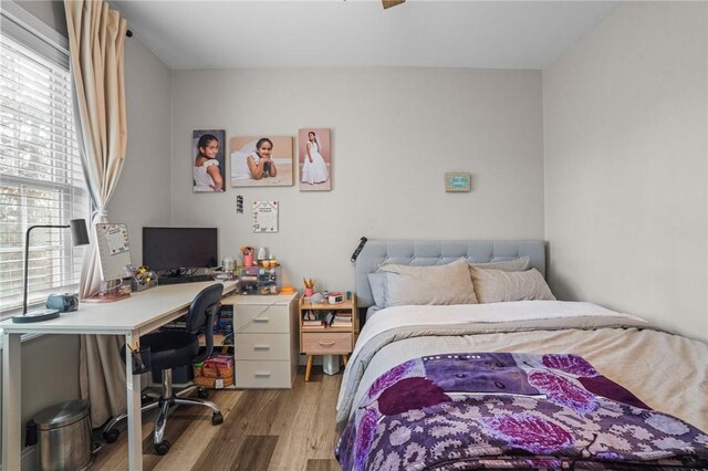 bedroom with light hardwood / wood-style flooring