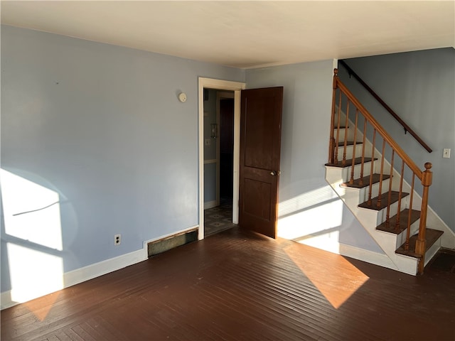 interior space featuring dark wood-type flooring