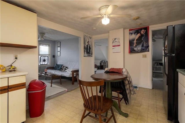 dining area with ceiling fan