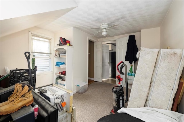 bedroom featuring ceiling fan and carpet floors