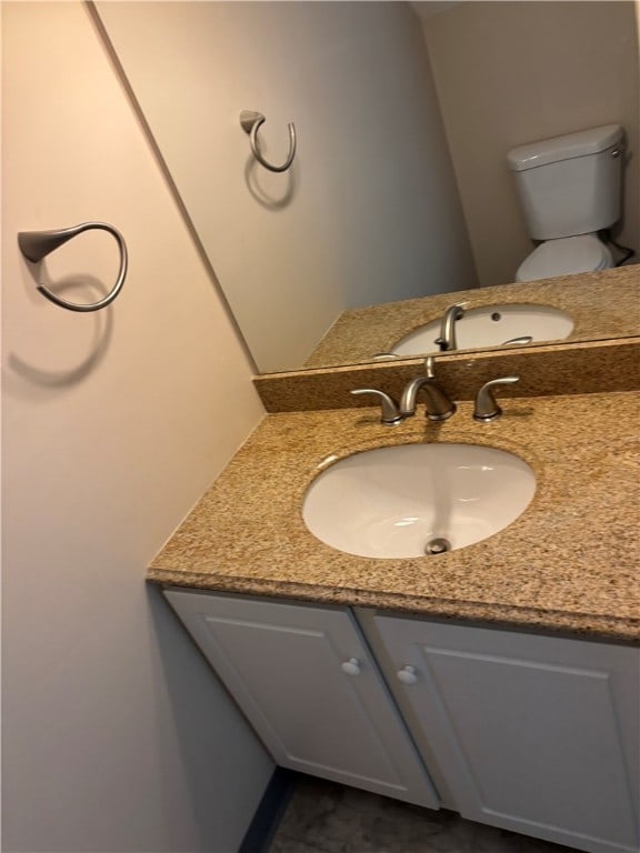 bathroom with toilet and sink