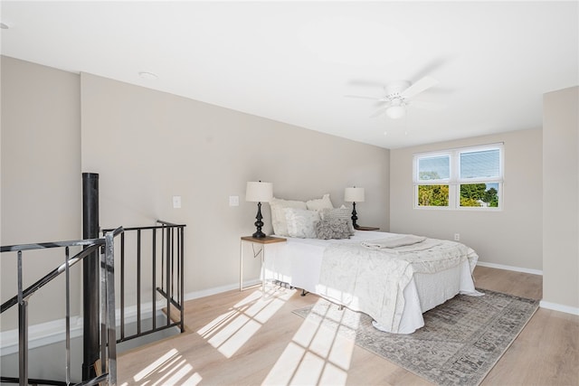 bedroom featuring ceiling fan and light wood-type flooring