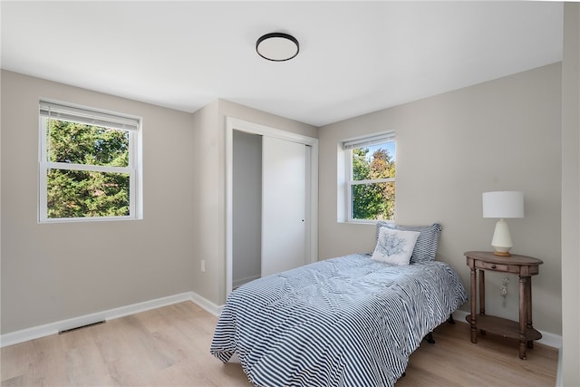 bedroom featuring light hardwood / wood-style flooring