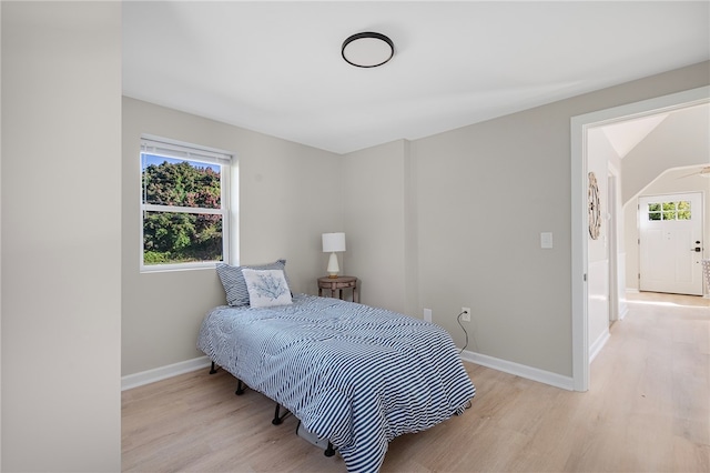 bedroom with light wood-type flooring