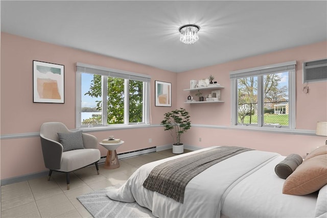 bedroom with a baseboard radiator, multiple windows, and light tile patterned floors