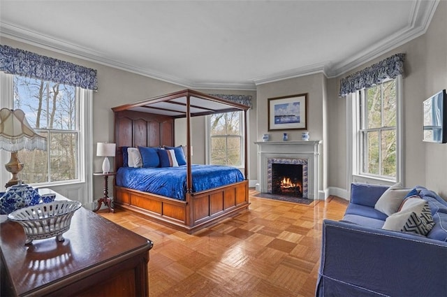 bedroom featuring parquet floors and crown molding