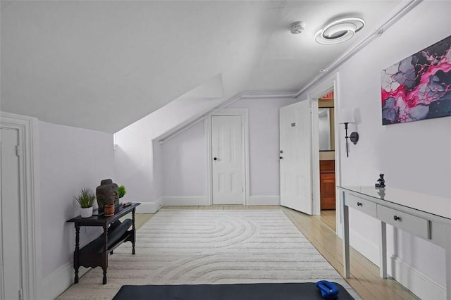 43 Old Beach Rd, Newport, RI 02840 - additional living space featuring lofted ceiling, light wood-style flooring, and baseboards