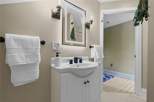 43 Old Beach Rd, Newport, RI 02840 - bathroom with baseboards, vanity, and wallpapered walls
