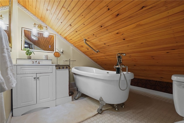 bathroom featuring a washtub, vanity, vaulted ceiling, and wooden ceiling