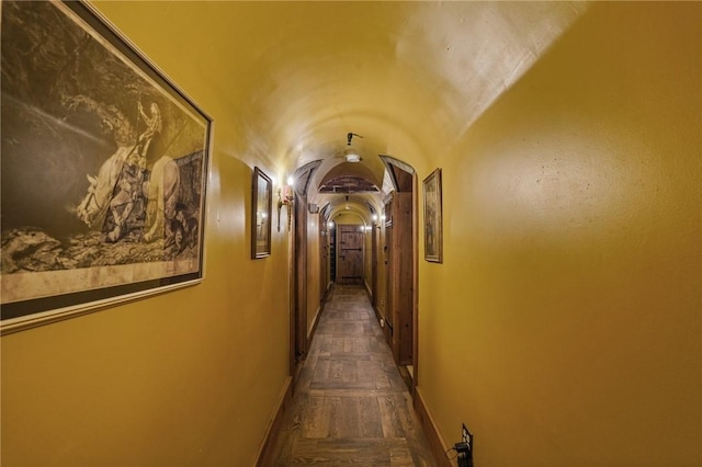 43 Old Beach Rd, Newport, RI 02840 - hallway with lofted ceiling, arched walkways, and baseboards