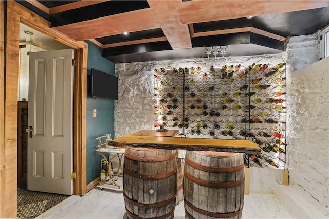 interior space featuring beamed ceiling and coffered ceiling