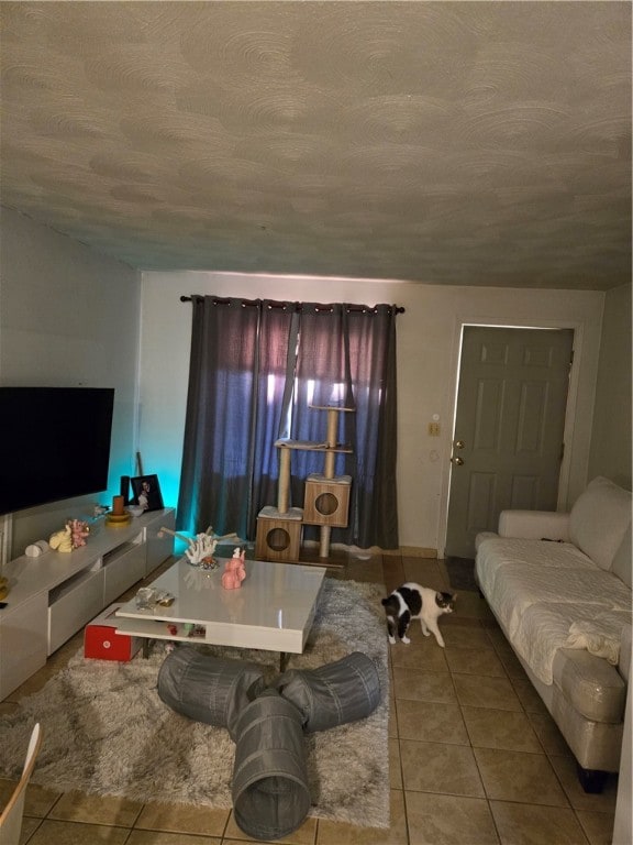 tiled living room with a textured ceiling