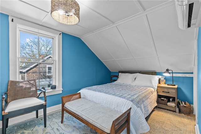 bedroom with lofted ceiling