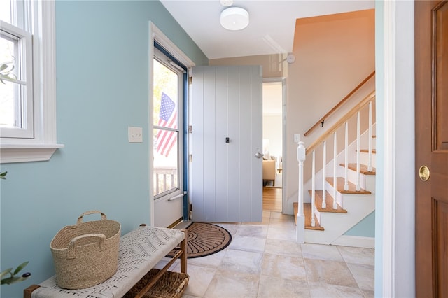 foyer entrance featuring a wealth of natural light