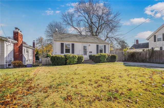 view of front of home with a front yard