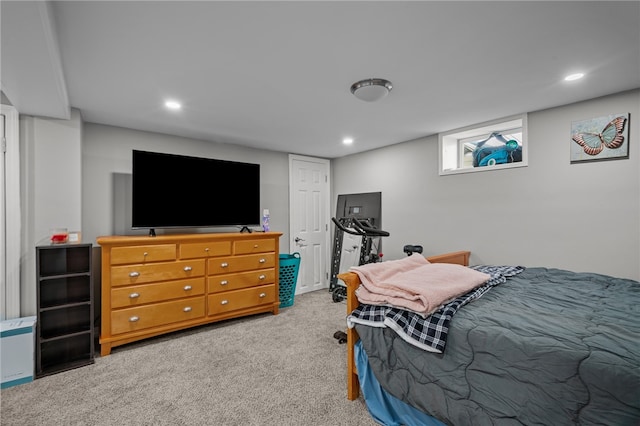 bedroom featuring light colored carpet