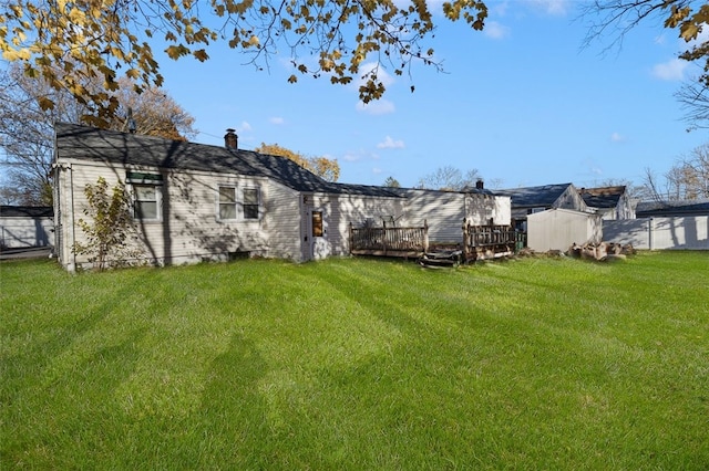 view of yard featuring a wooden deck