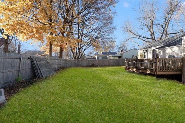 view of yard with a wooden deck