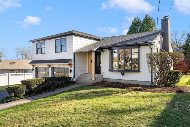 split level home with a front lawn