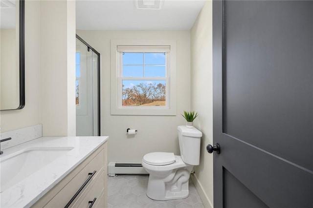 bathroom featuring vanity, walk in shower, toilet, tile patterned floors, and baseboard heating