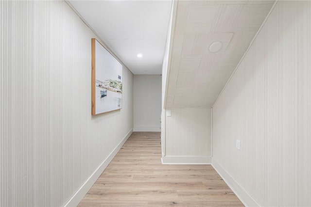 corridor with light wood-type flooring