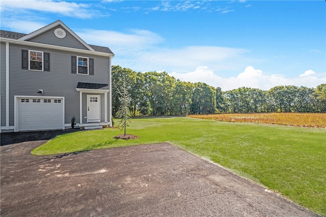 view of yard featuring a garage