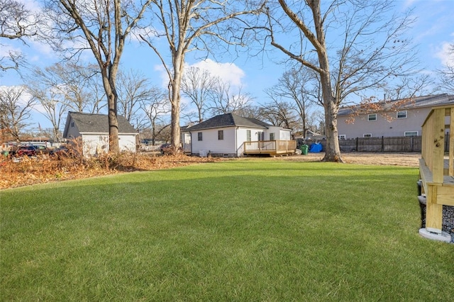 view of yard featuring a wooden deck