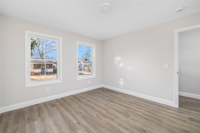 empty room featuring light hardwood / wood-style floors