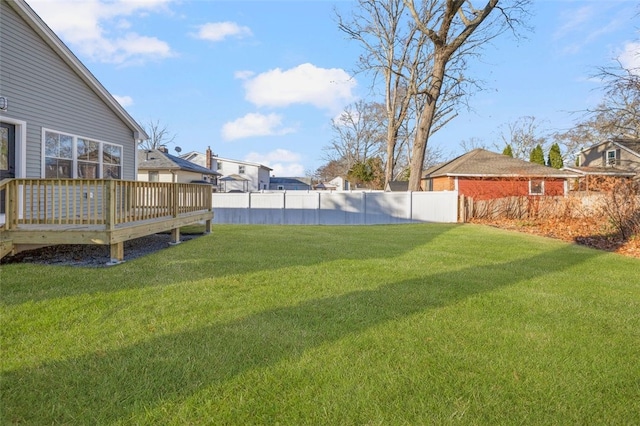 view of yard with a deck