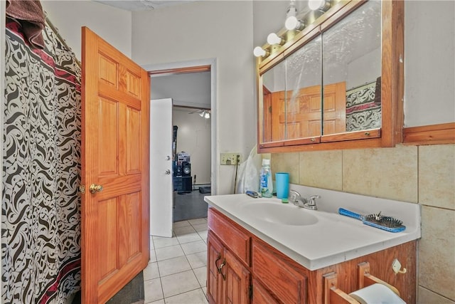 bathroom with tile patterned flooring and vanity