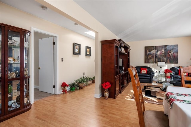 living room with light hardwood / wood-style flooring