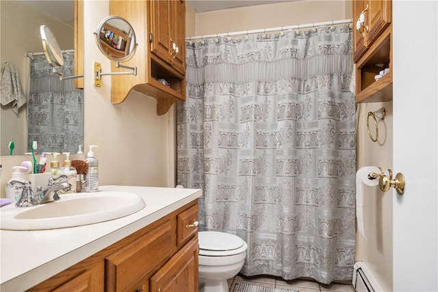 bathroom featuring tile patterned floors, walk in shower, vanity, a baseboard radiator, and toilet