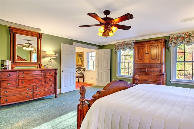 bedroom with carpet, ceiling fan, and ornamental molding