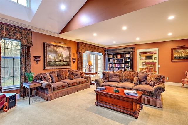 living room with plenty of natural light, crown molding, and light carpet