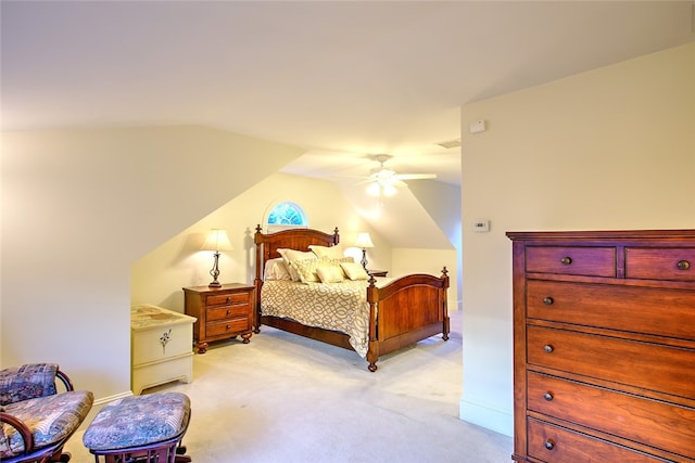 carpeted bedroom featuring ceiling fan and lofted ceiling