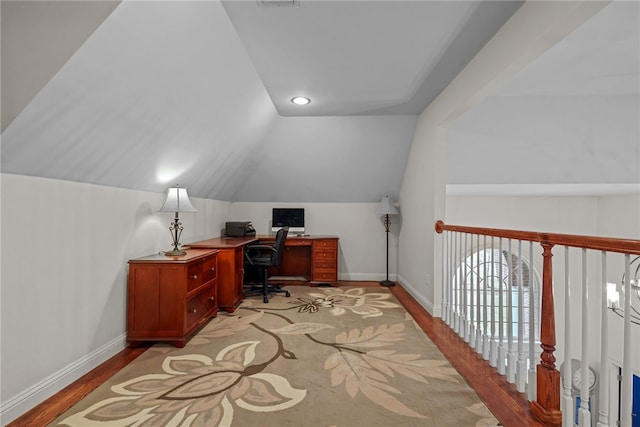 office space featuring light hardwood / wood-style flooring and vaulted ceiling