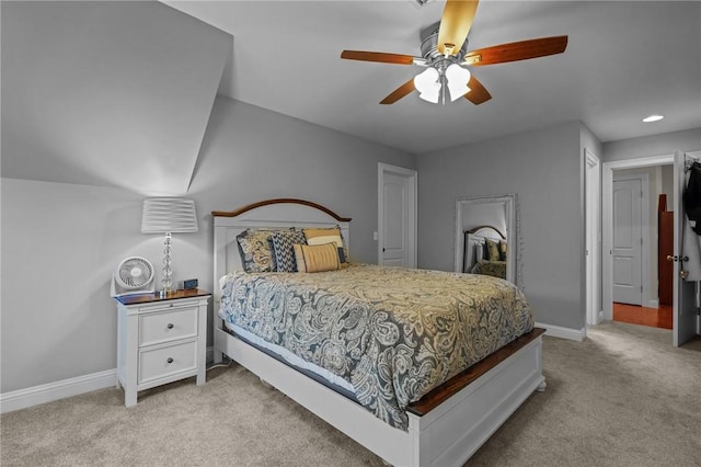 carpeted bedroom with ceiling fan