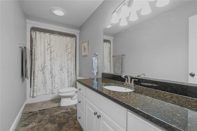 full bathroom featuring shower / bath combination with curtain, vanity, and toilet