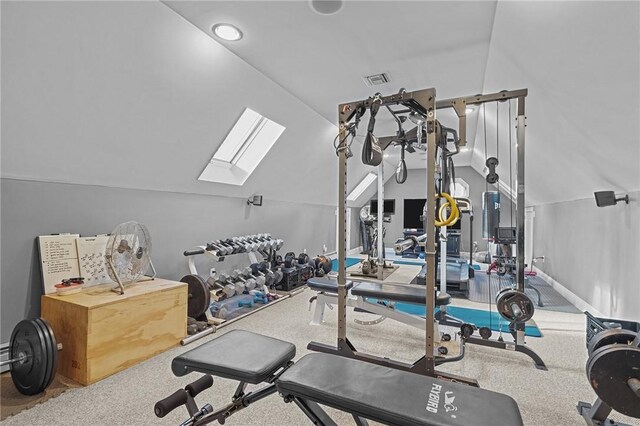 exercise area featuring lofted ceiling and carpet floors