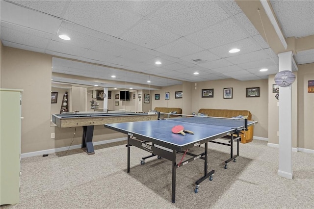 game room featuring carpet floors and a paneled ceiling