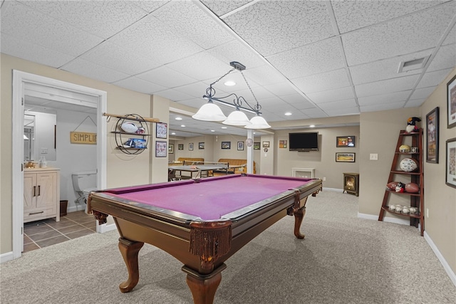 game room featuring a drop ceiling, carpet floors, and billiards